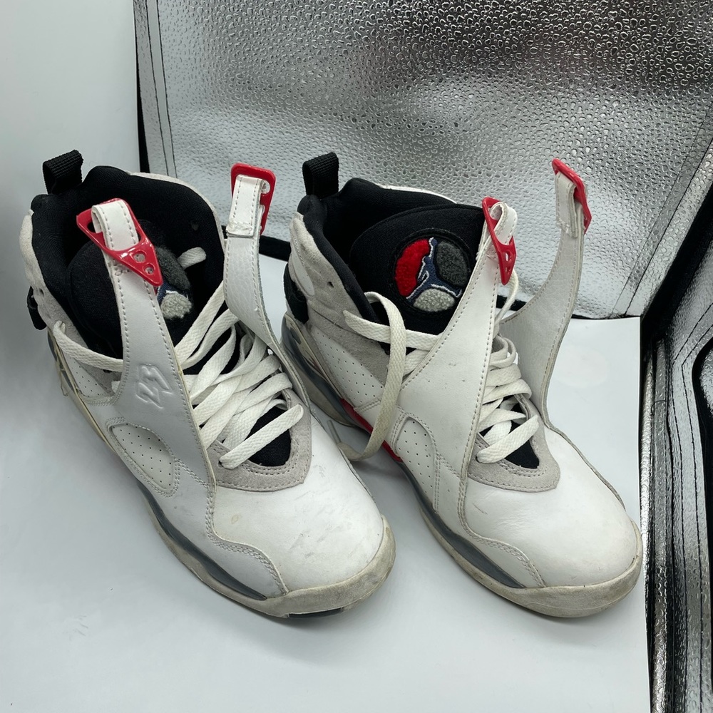 White grey and red Jordan’s size 5.5